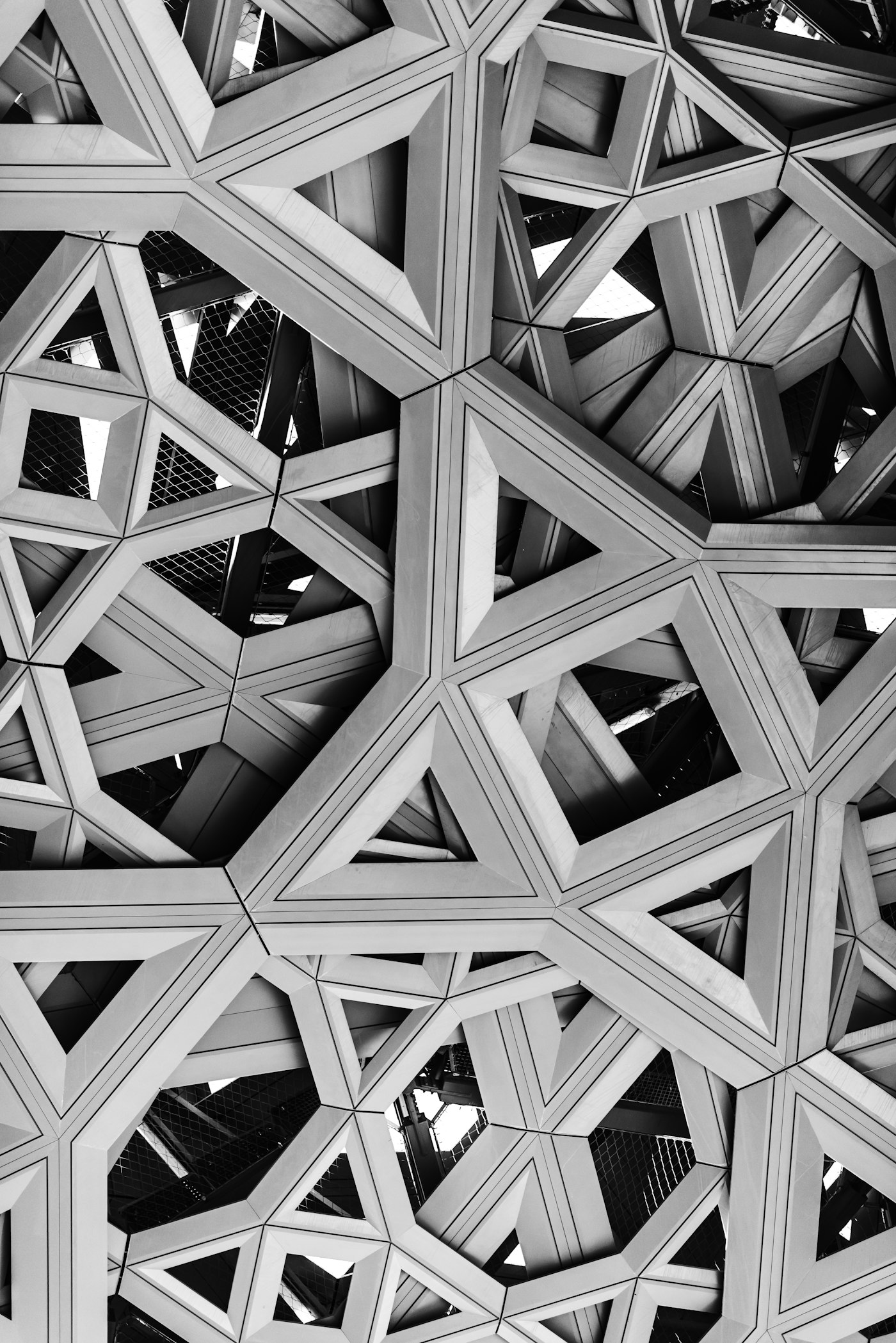 Geometric lattice of the Louvre Abu Dhabi dome — light through structure